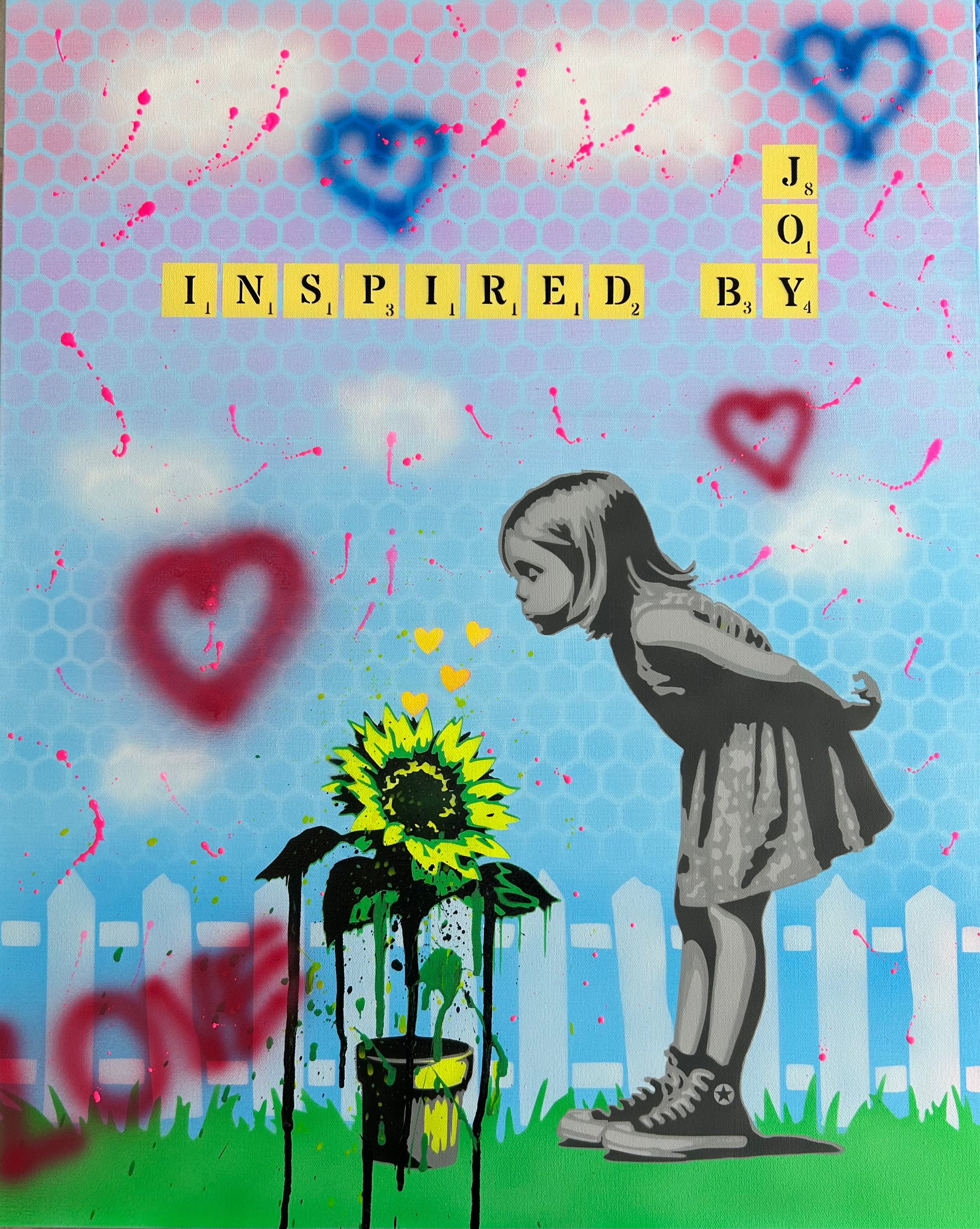 Stencil pop art of a girl bending toward a sunflower under a blue sky, with spray-painted hearts and "Inspired by Joy" in Scrabble tiles.